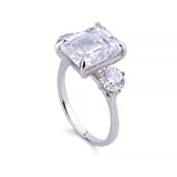 5ct Emerald and side Round Diamond Ring