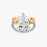 Pear Solitaire with Side Diamond Ring