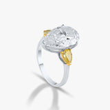 Pear Solitaire with Side Diamond Ring