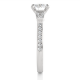 Round Diamond with Side Baguette Diamond Ring